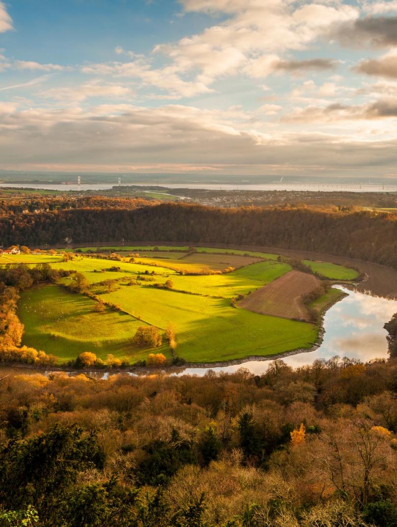 The River Wye surrounded by autumnal trees and fields