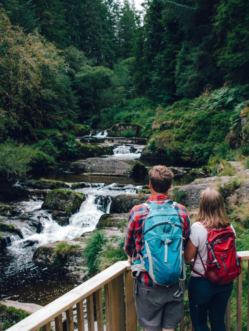 couple looking at river from platform.