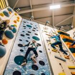 Scaling the indoor adventure climb at Adrenaline Indoors, Adventure Parc Snowdonia.