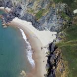 Aerial view of Llangrannog beach and the cliffs