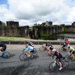 Image of Velothon Wales competitors cycling passed Caerphilly Castle
