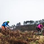 Two mountain bikers on a trail at Afan Forest Park.