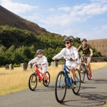 family on bikes in Elan Valley.