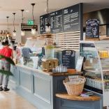 Counter in bakery with customer.
