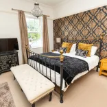 luxury hotel bedroom.