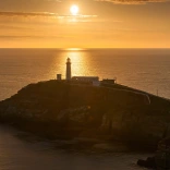 South Stack Lighthouse at sunset.