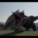 A very large angry looking red dragon in a field, with wings spread wide and mouth open.
