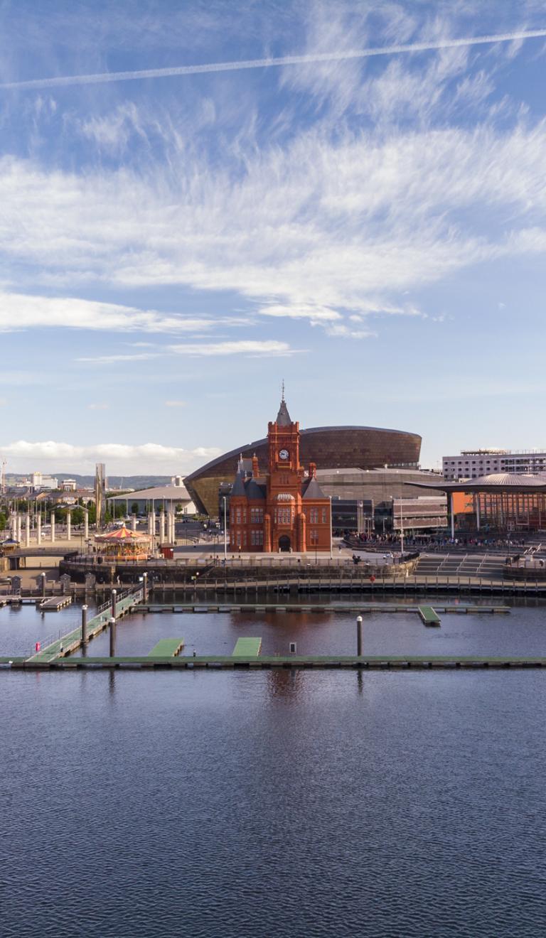 Cardiff Bay showing buildings along the quayside.