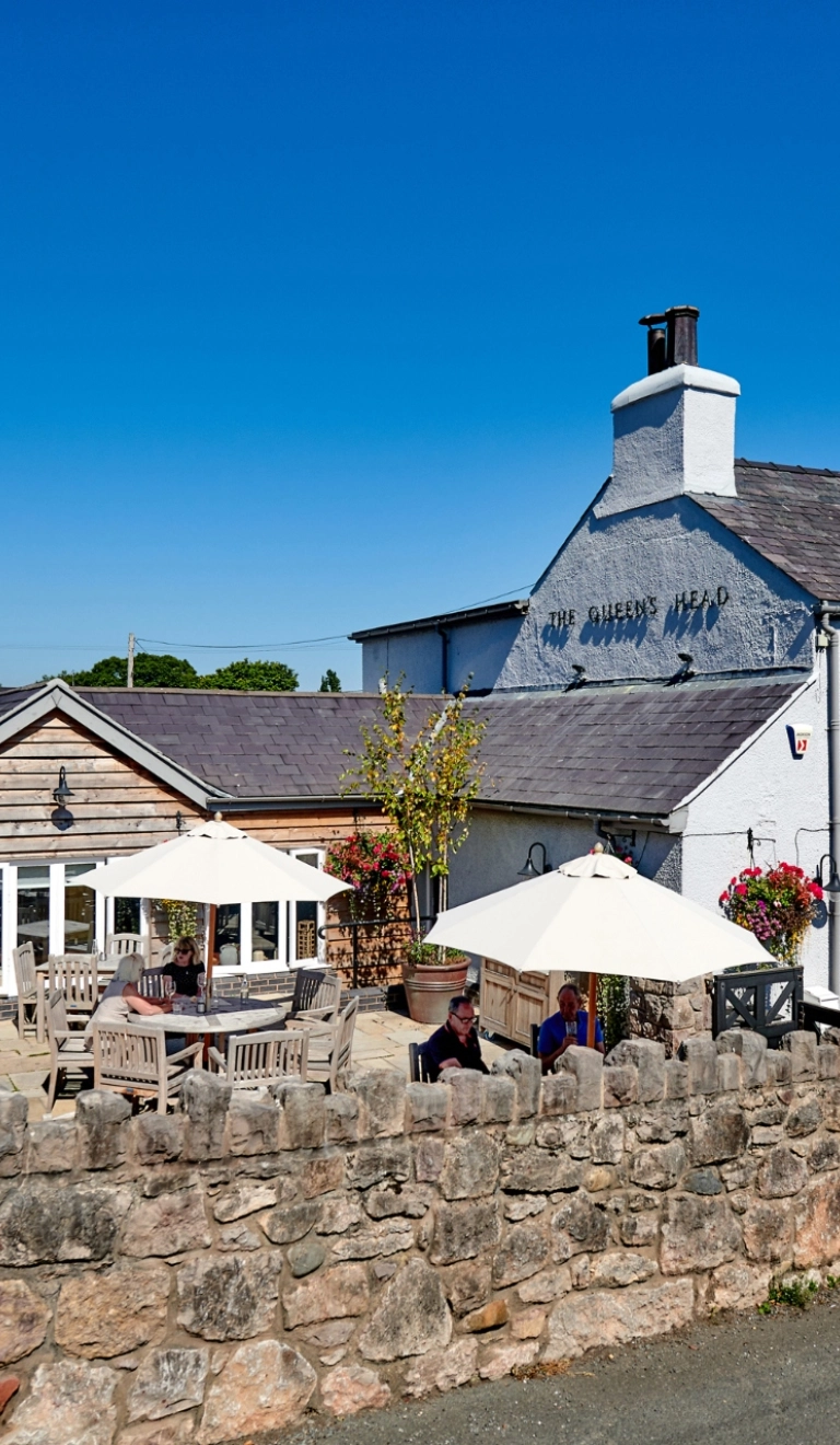 exterior of pub, with beer garden.